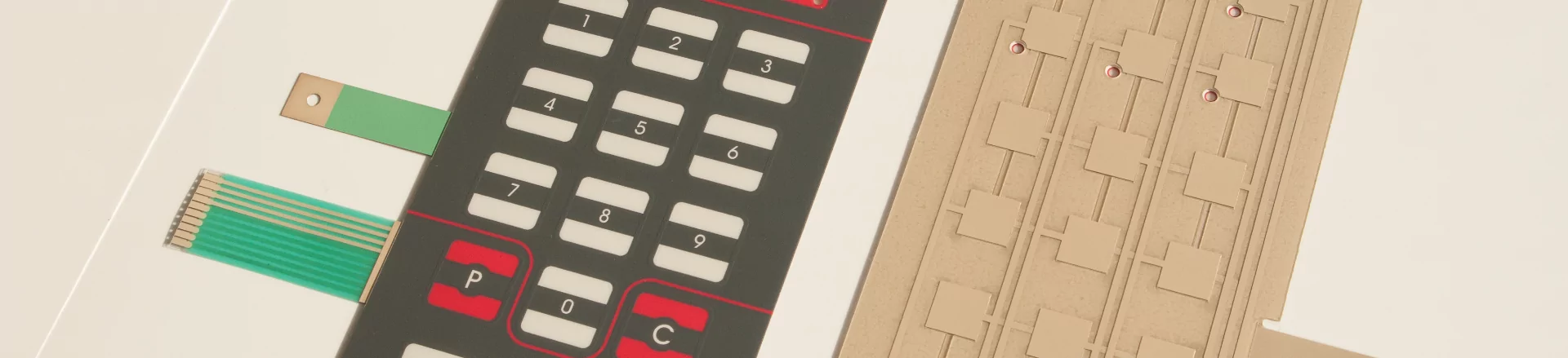 A close up of a printed circuit board with custom label solutions.
