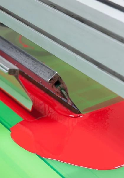 A cnc machine cutting a high quality piece of plastic for decals or medical labels.