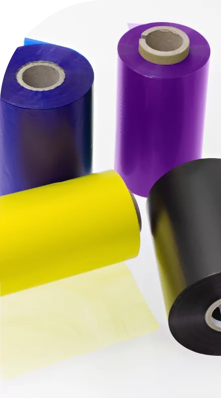 Four rolls of custom labeled colored ribbons.